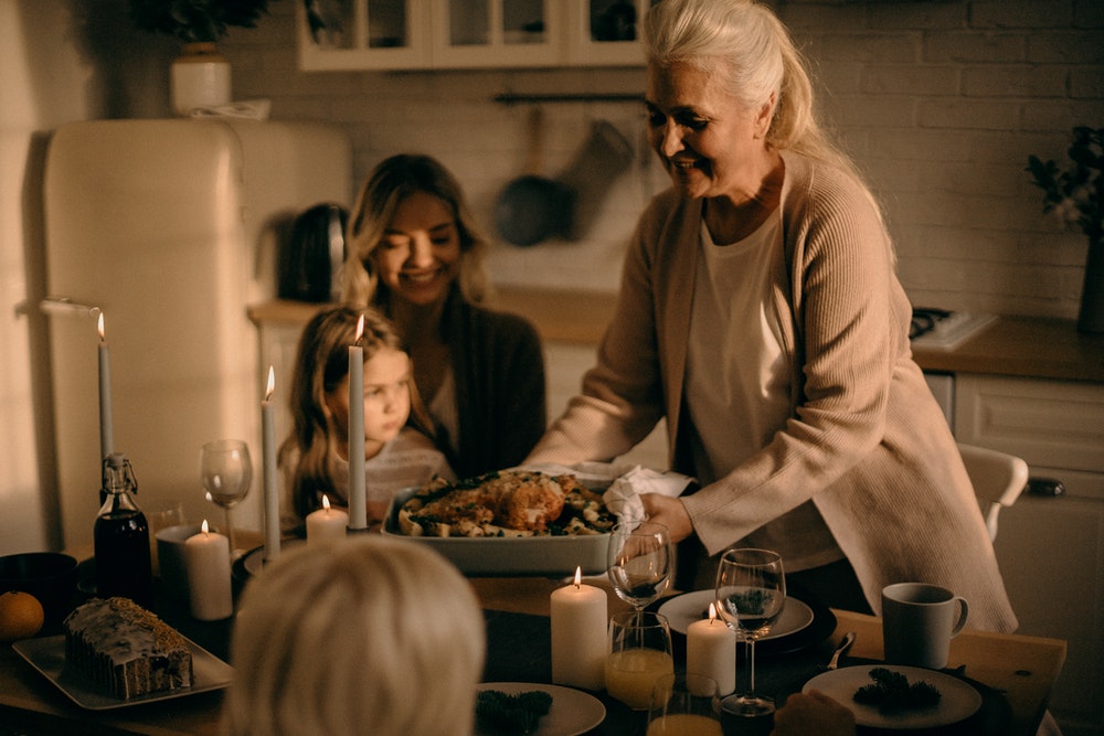 christmas turkey being served on the table in a family setting