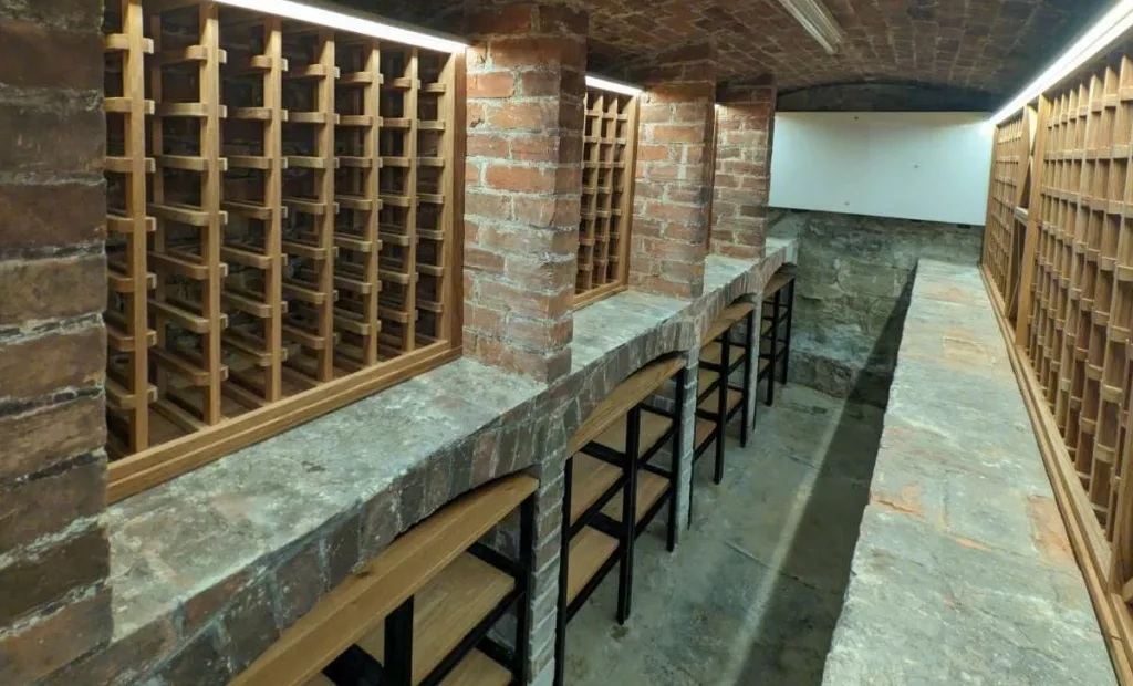 Feature solid oak wine rack in cellar